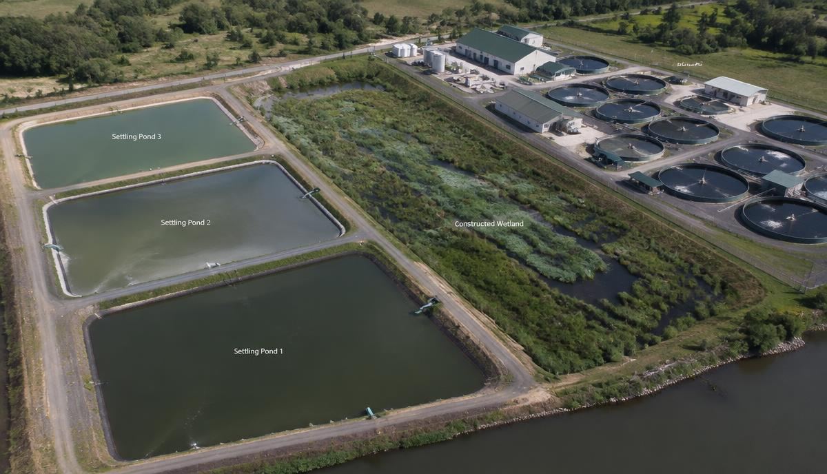 settling ponds next to a fish farm